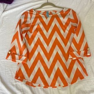 Dina Be woman’s orange and white zigzag 3/4 sleeve blouse size small